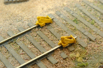 JL Innovative Design 335 HO Scale 12 Piece Rail Car Stops with Derails