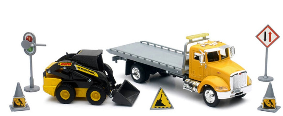 New Ray Toys 16173 1/43 Die Cast Peterbilt Flatbed Truck with New Holland L228 Skid Steer