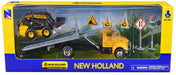 New Ray Toys 16173 1/43 Die Cast Peterbilt Flatbed Truck with New Holland L228 Skid Steer