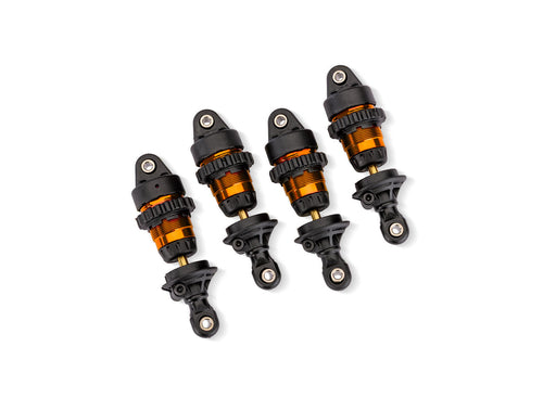 Traxxas 10865-ORNG Orange Anodized GTR Short Short PTFE-coated bodies with TiN Shafts (4 Pack)