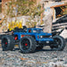 ARRMA ARA4410V2T2 1/10 OUTCAST 4x4 4S BLX Brushless Stunt Truck - Blue
